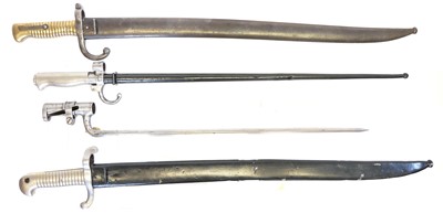Lot 221 - Three French bayonets and scabbards and a socket bayonet