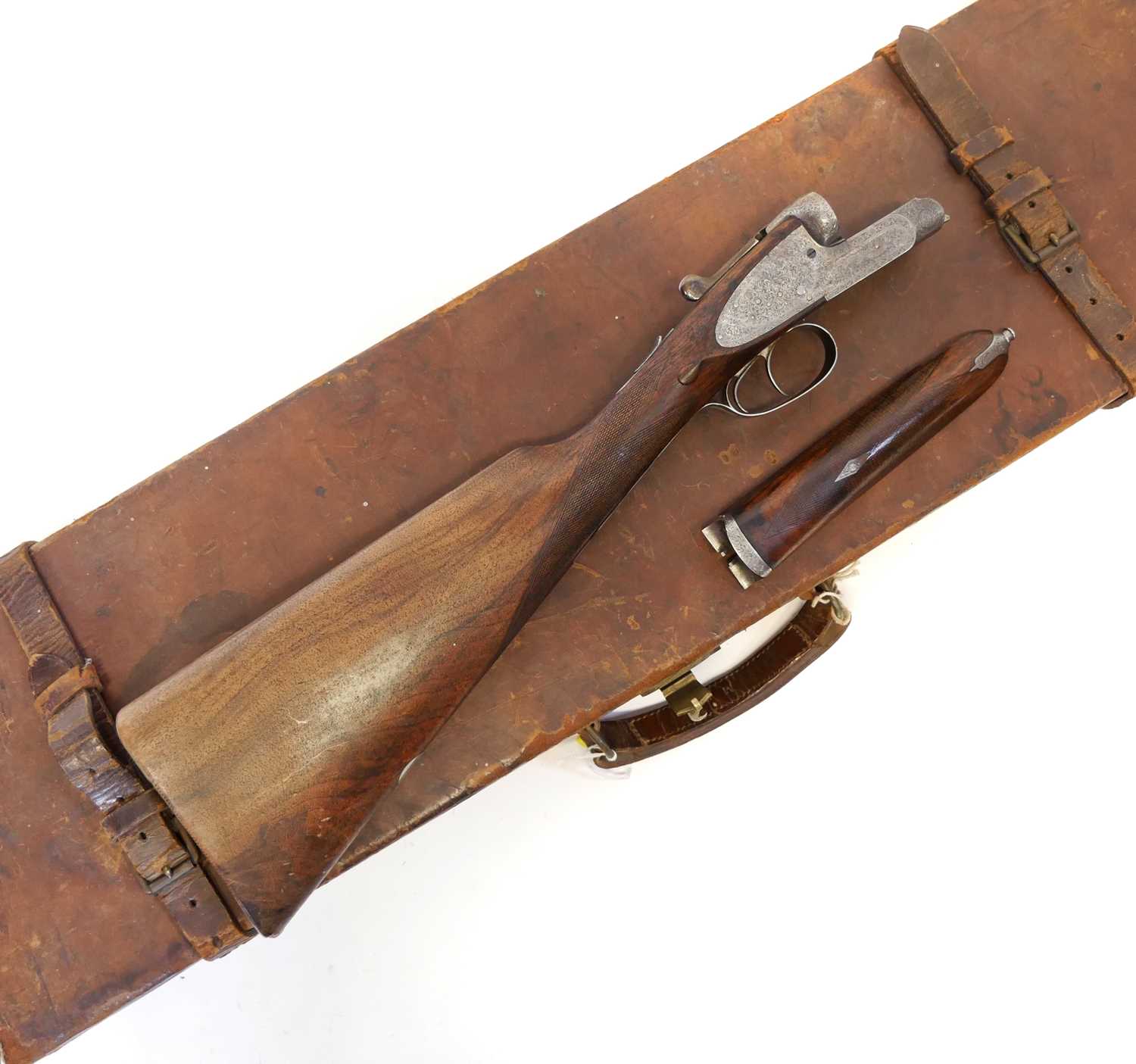 Lot 359 - The stock, action and leather case for a Horatio Jones 12 bore side by side shotgun. LICENCE REQUIRED