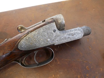 Lot 359 - The stock, action and leather case for a Horatio Jones 12 bore side by side shotgun. LICENCE REQUIRED