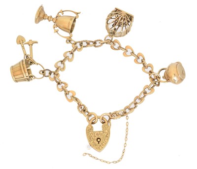 Lot 54 - A 9ct gold charm bracelet by Josef Pronczuk