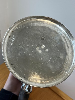 Lot 12 - A George II silver coffee jug