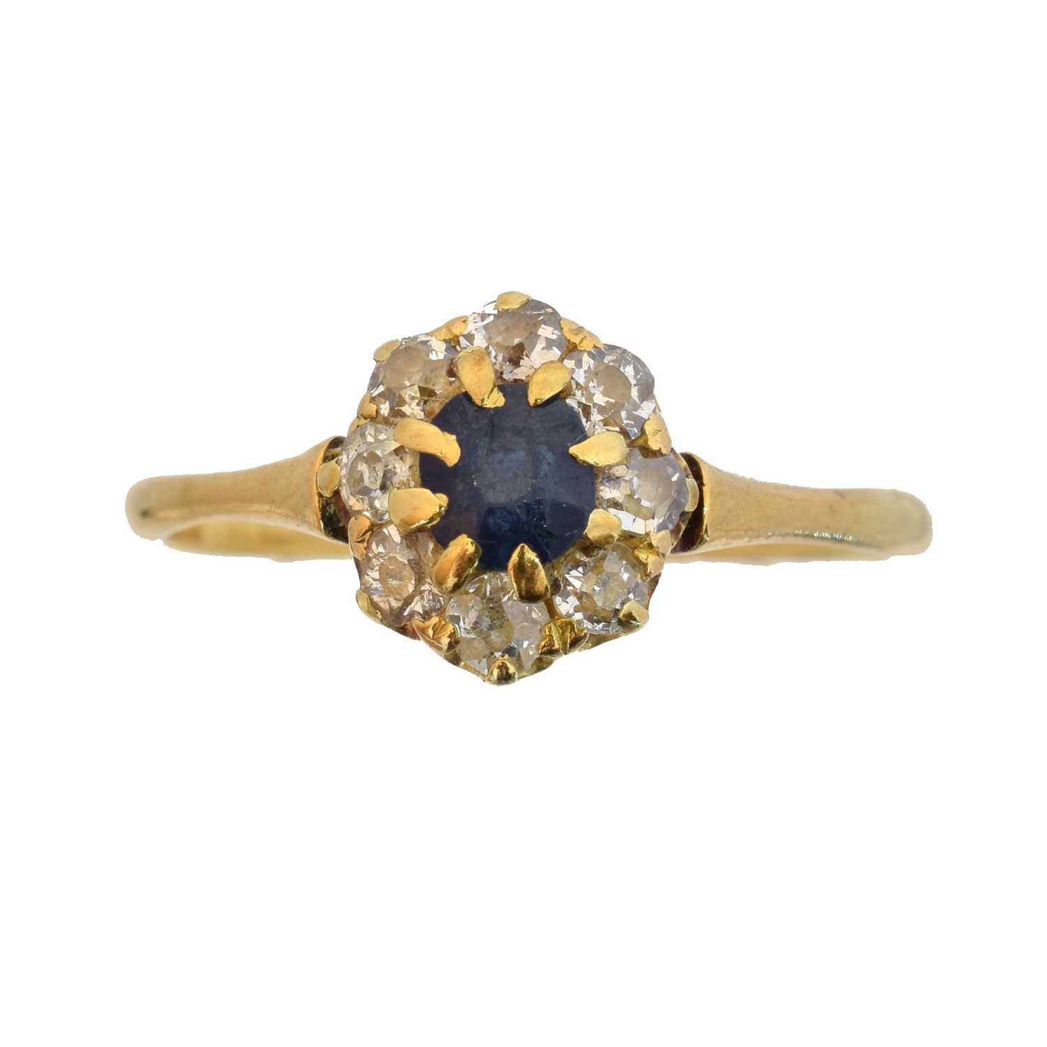Lot 77 - A sapphire and diamond cluster ring