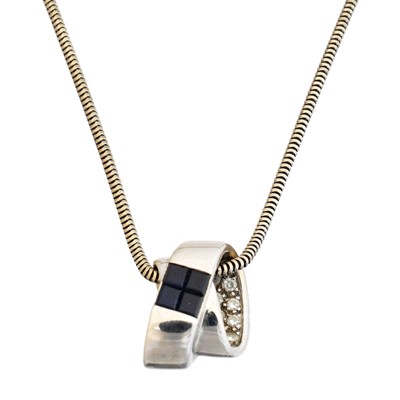 Lot 110 - An 18ct gold sapphire and diamond pendant