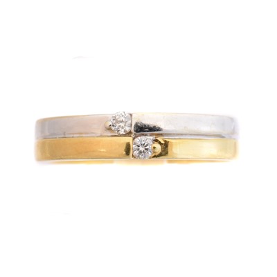 Lot 206 - An 18ct gold diamond band ring