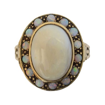 Lot 244 - A 9ct gold opal poison ring