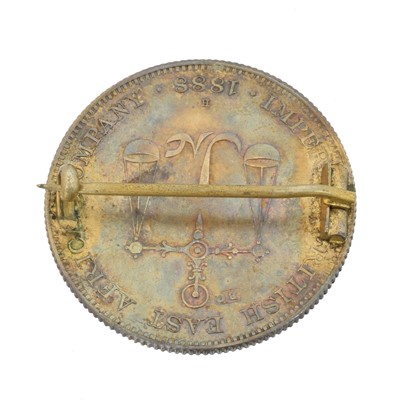 Lot 15 - A Victorian enamelled Mombasa rupee brooch