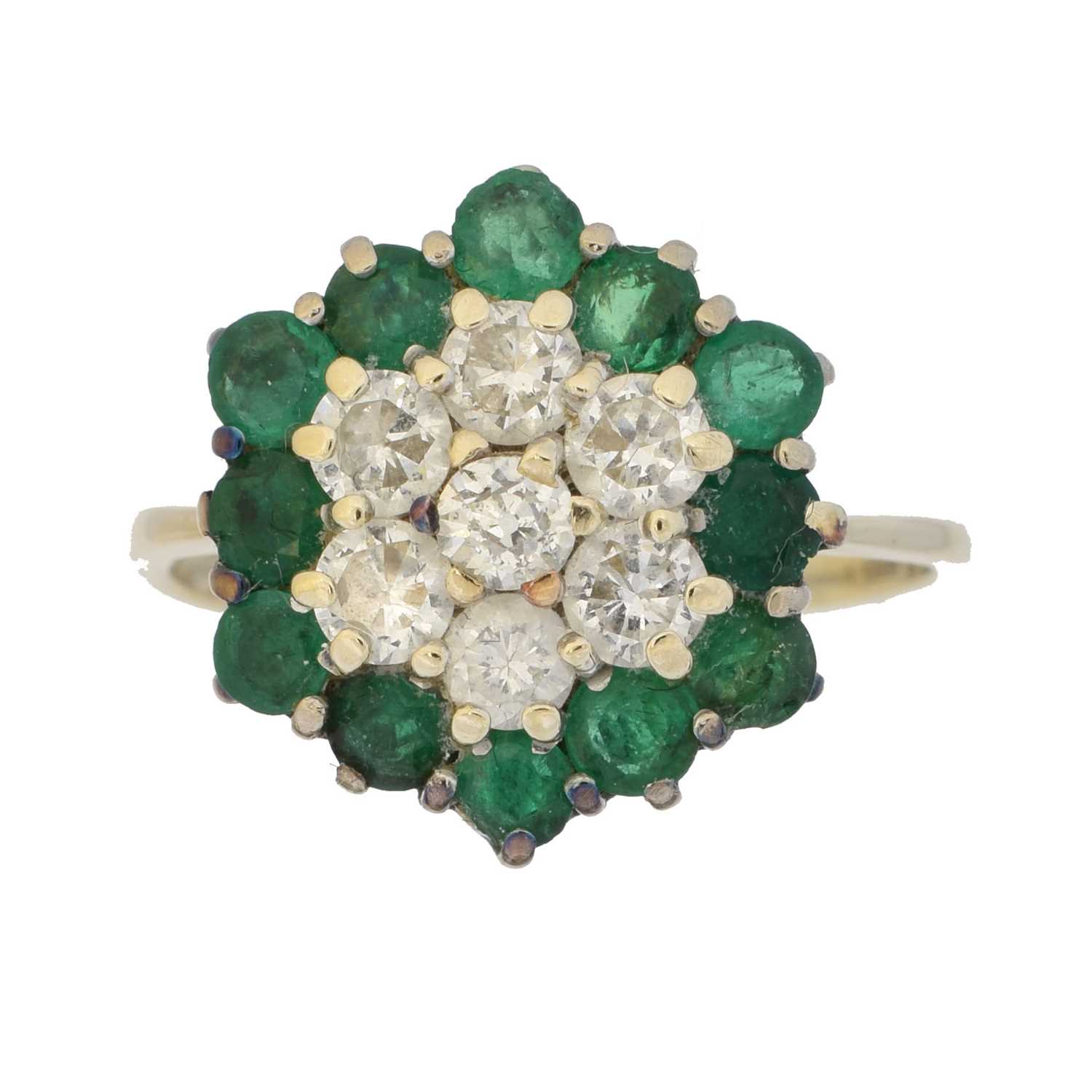 Lot 199 - An 18ct gold emerald and diamond cluster ring by Mappin & Webb
