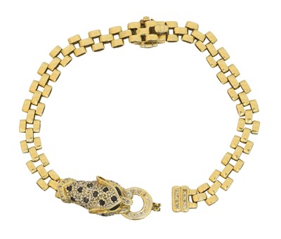 Lot 39 - An 18ct gold diamond and sapphire bracelet