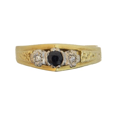 Lot 232 - An 18ct gold sapphire and diamond three stone ring
