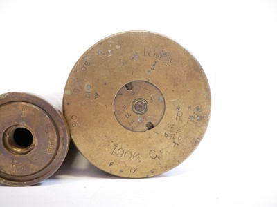Lot 231 - Four inert artillery rounds and a shell case.