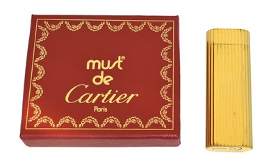 Lot 185 - A Must De Cartier gold plated lighter