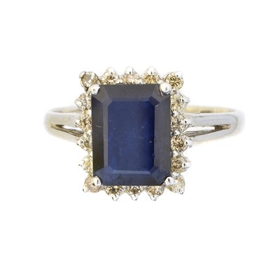 Lot 71 - A sapphire and diamond cluster ring