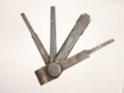 Lot 478 - Martini Henry combination tool, oil bottle, jag, cleaning rod attachment and a muzzle protector