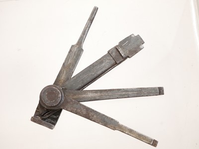 Lot 478 - Martini Henry combination tool, oil bottle, jag, cleaning rod attachment and a muzzle protector