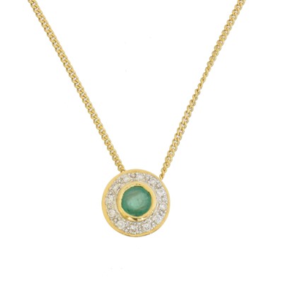 Lot 59 - An emerald and diamond pendant