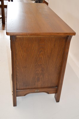 Lot 73 - Arts & Crafts style oak side cabinet by 'Sherry'