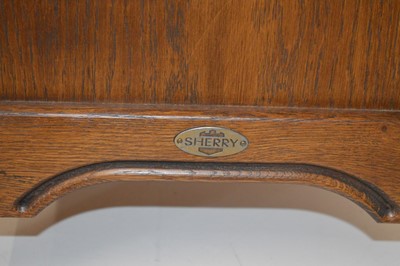 Lot 73 - Arts & Crafts style oak side cabinet by 'Sherry'