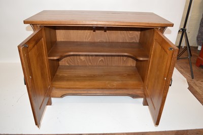 Lot 73 - Arts & Crafts style oak side cabinet by 'Sherry'