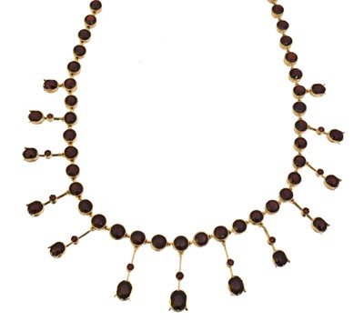 Lot 71 - An 18ct gold garnet fringe necklace