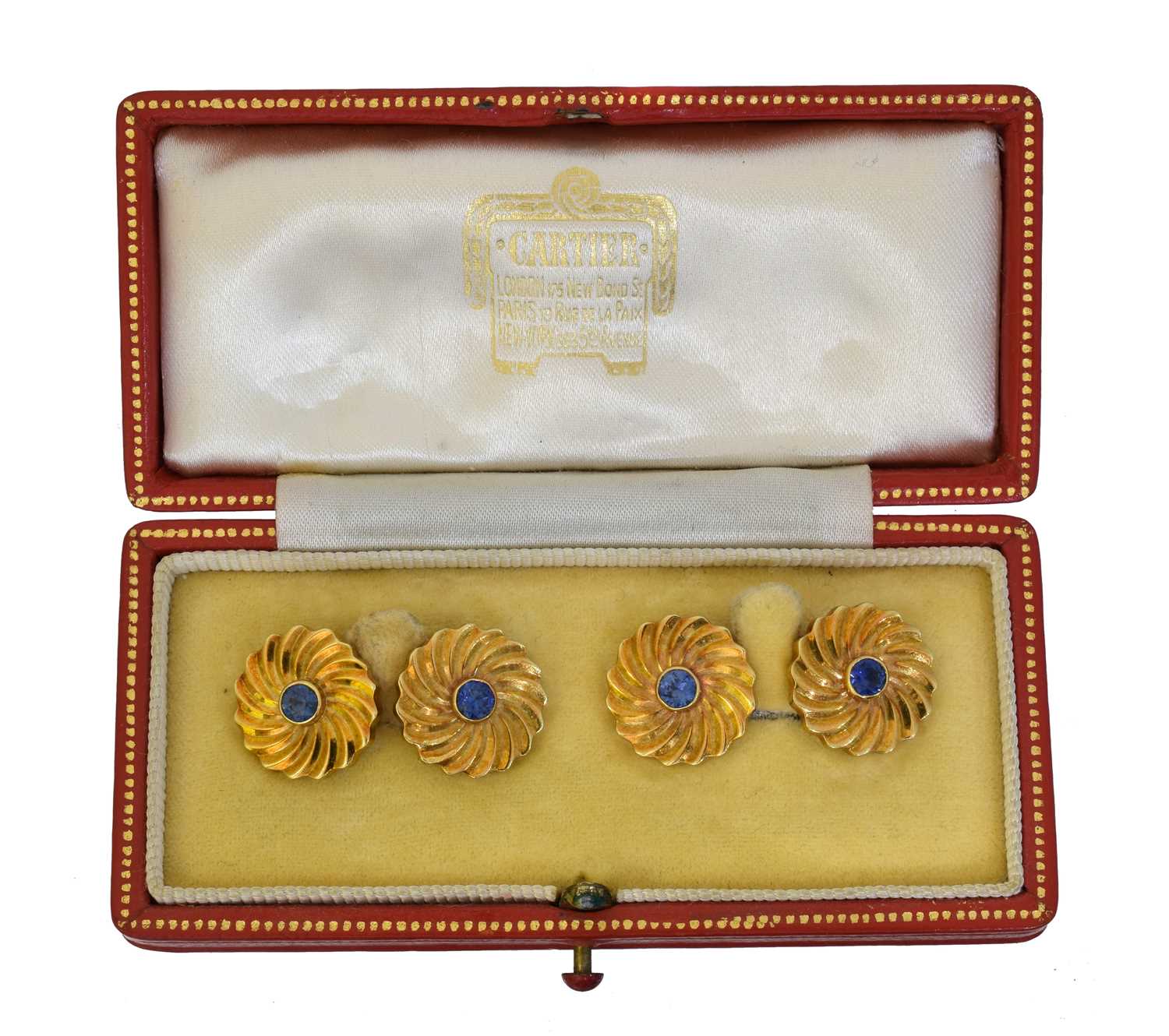 181 - A pair of 18ct gold sapphire cufflinks by Cartier,