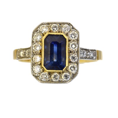 Lot 158 - An 18ct gold sapphire and diamond cluster ring