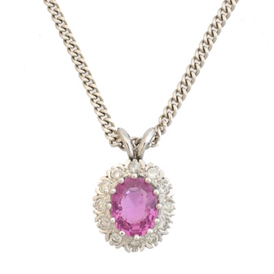 Lot 58 - A pink sapphire and diamond pendant