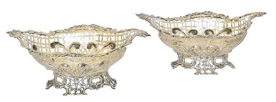 Lot A pair of Victorian silver bonbon dishes