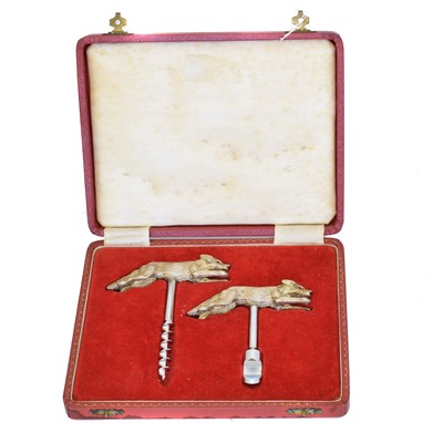 Lot A cased set of silver topped corkscrews