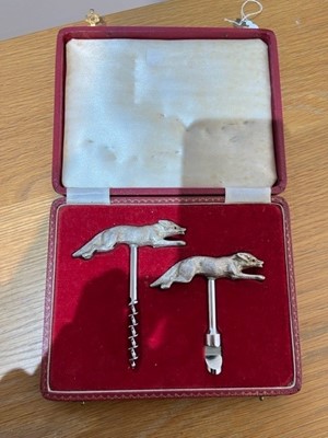 Lot 84 - A cased set of silver topped corkscrews