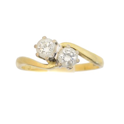 Lot 160 - An 18ct gold diamond crossover ring