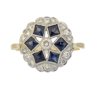 Lot 163 - A sapphire and diamond cluster ring