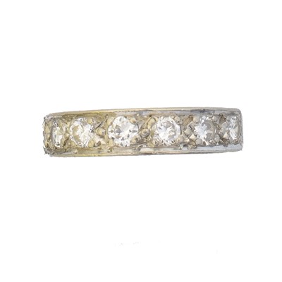 Lot 107 - An 18ct gold diamond band ring