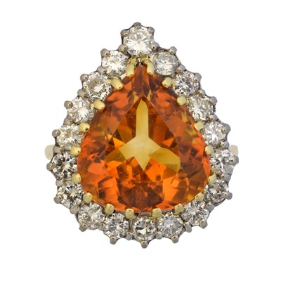 Lot 105 - A citrine and diamond cluster ring