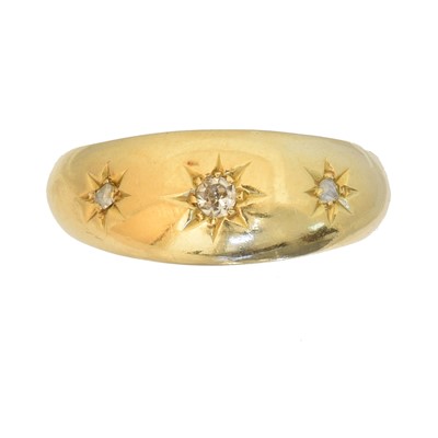 Lot 120 - An early 20th century 18ct gold diamond three stone ring
