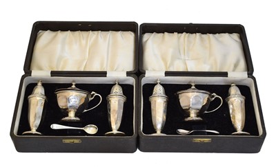 Lot 101 - Two George VI cased silver cruet sets