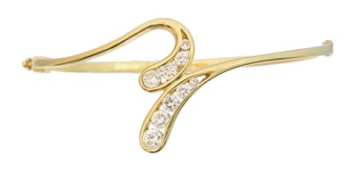 Lot 31 - An 18ct gold diamond bangle by David M Robinson