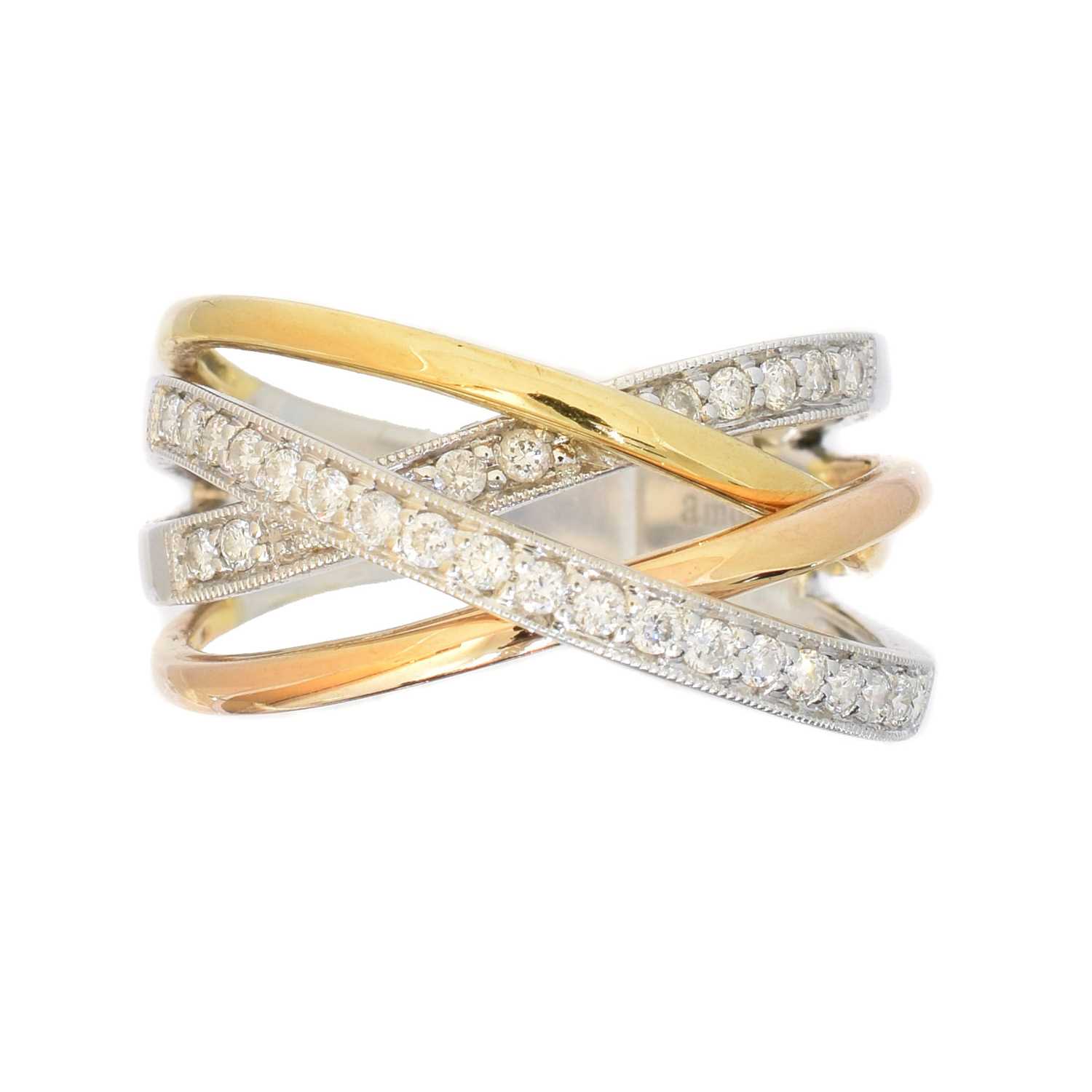 Lot 118 - An 18ct gold diamond band ring
