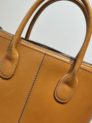 Lot 41 - Two Tod's leather handbags