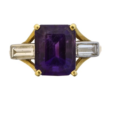 Lot 174 - An 18ct gold amethyst and diamond three stone ring