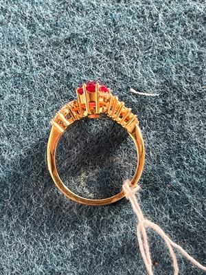 Lot 97 - An 18ct gold spinel and diamond dress ring