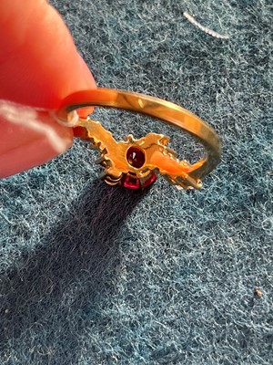 Lot 97 - An 18ct gold spinel and diamond dress ring