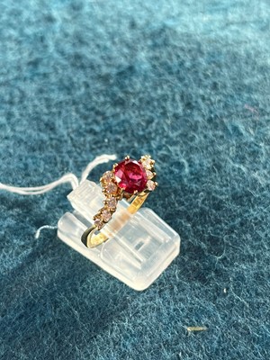 Lot 97 - An 18ct gold spinel and diamond dress ring
