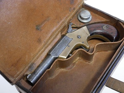 Lot 11 - Cased J.M. Marlin 'OK' 30 calibre Derringer...