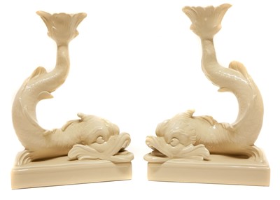 Lot 189 - Pair of Wedgwood drab ware Dolphin candlesticks