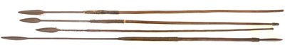 Lot 115 - Four African throwing spears. Buyer must be...