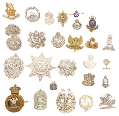 Lot 142 - Twenty six British Army cap badges and...