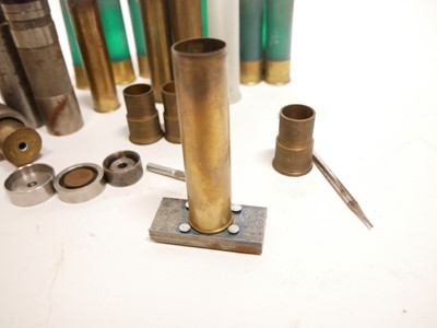 Lot 417 - Eight bore cartridges and tools, including two...