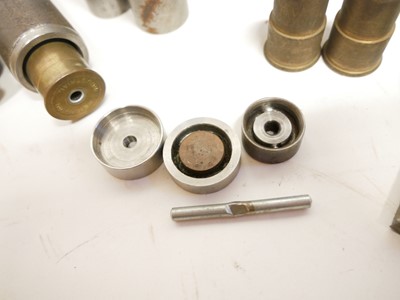 Lot 417 - Eight bore cartridges and tools, including two...