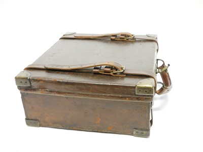 Lot 496 - Oak and leather cartridge magazine by Wanless...