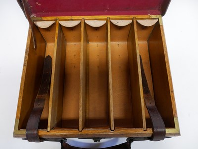 Lot 496 - Oak and leather cartridge magazine by Wanless...